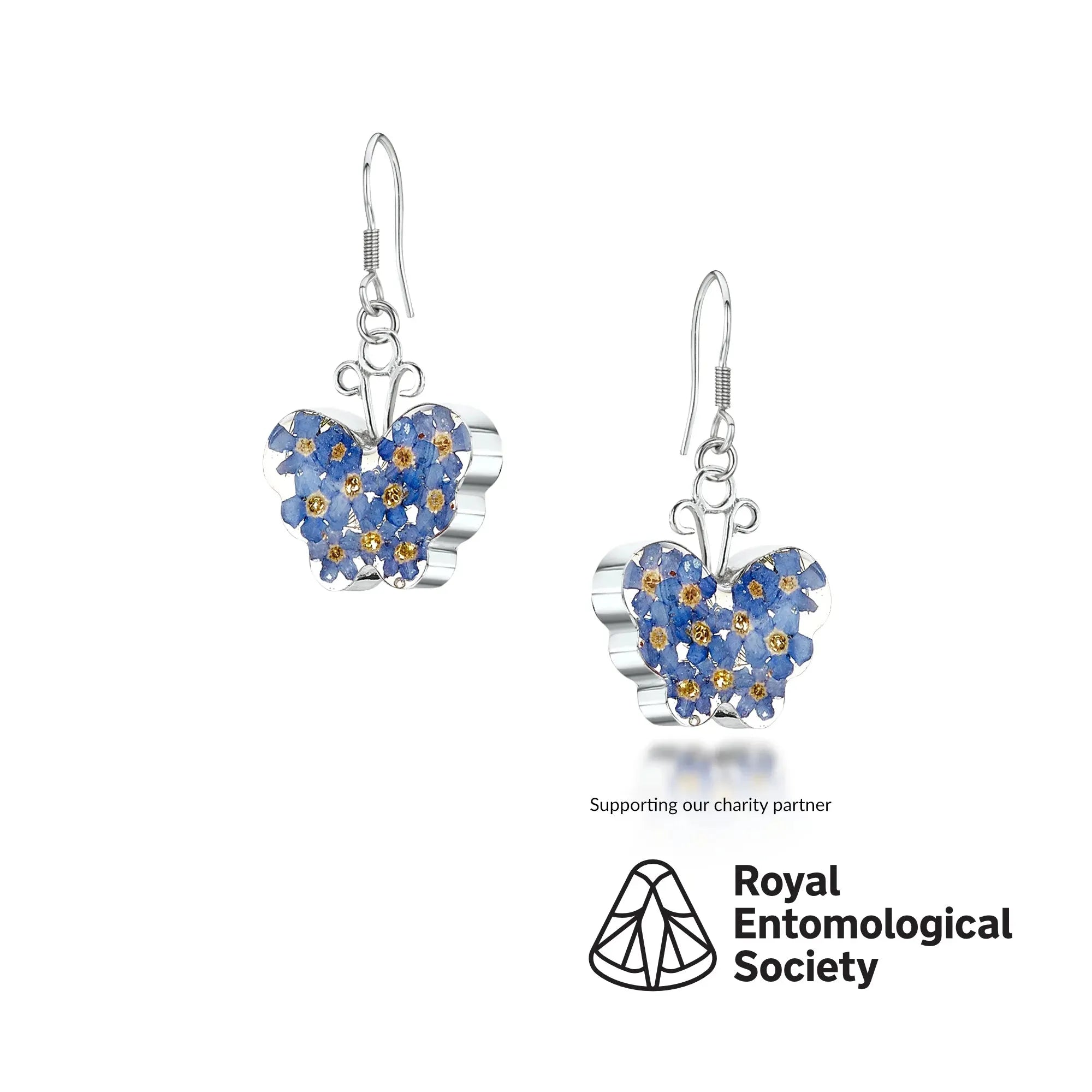 Butterfly earrings by  Shrieking Violet® Sterling silver dangle drop earrings with real forget-me-not flowers. Ideal jewellery for butterfly lover