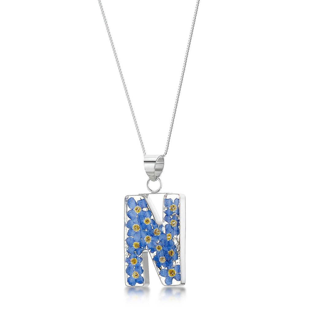 Initial pendant necklace with real forget me not flowers by Shrieking Violet® Ideal birthday gift.