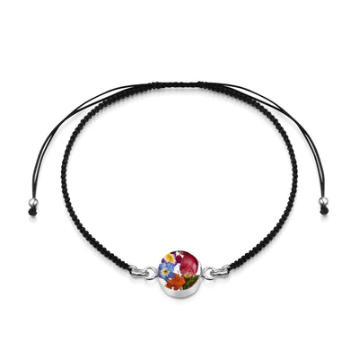 Pulsera tejida negra con dije de flor en Plata de Ley - Flor mixta - Redonda