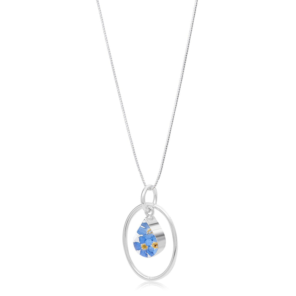 Forget-me-not necklace by Shrieking Violet® Sterling silver teardrop pendant with real forget-me-nots & silver oval surround. Ideal Mothers day gift.