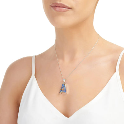 Initial pendant necklace with real forget me not flowers by Shrieking Violet® Ideal birthday gift.