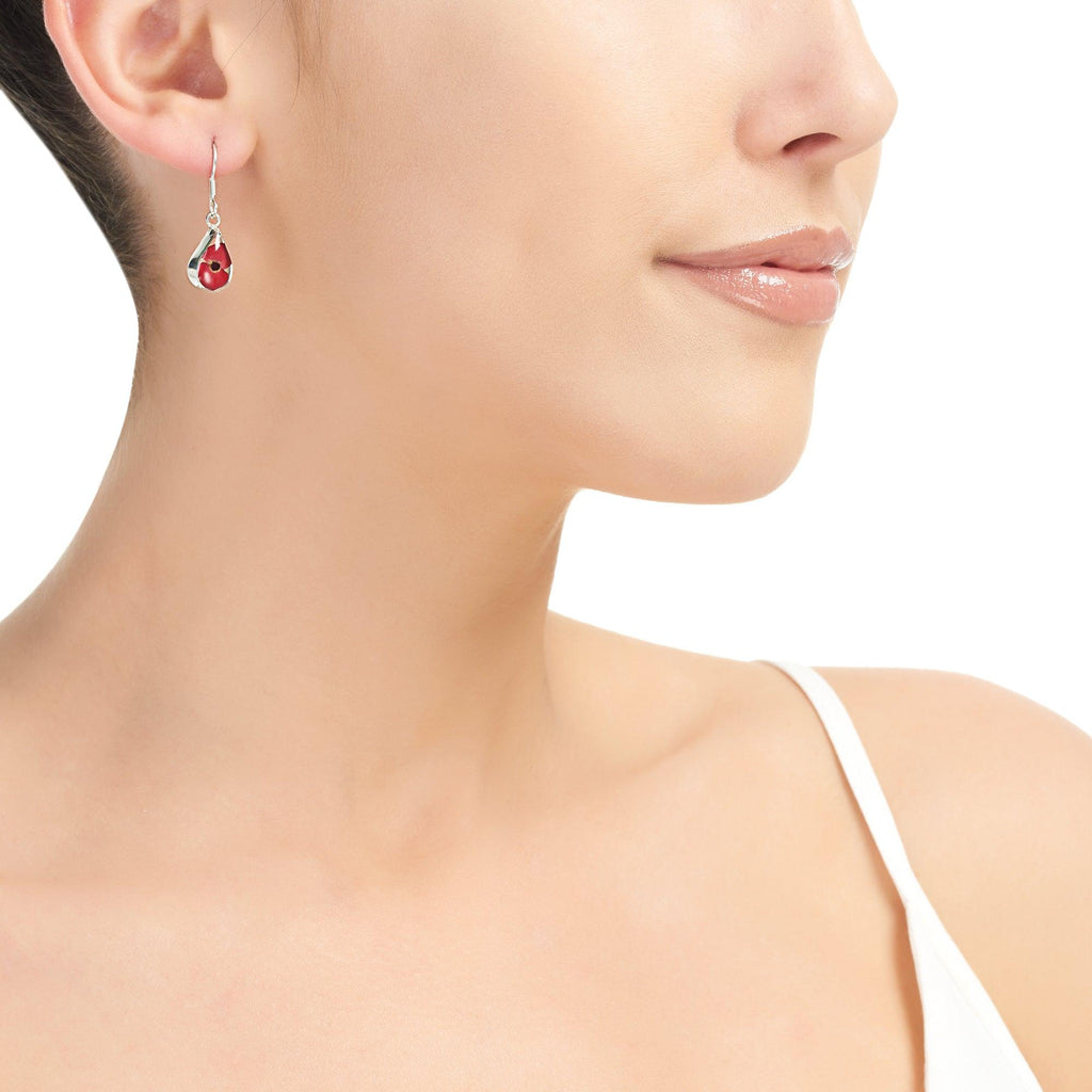 Poppy earrings by Shrieking Violet® Sterling silver drop dangle teardrop earrings with tiny real Euphrbia milii flowers.