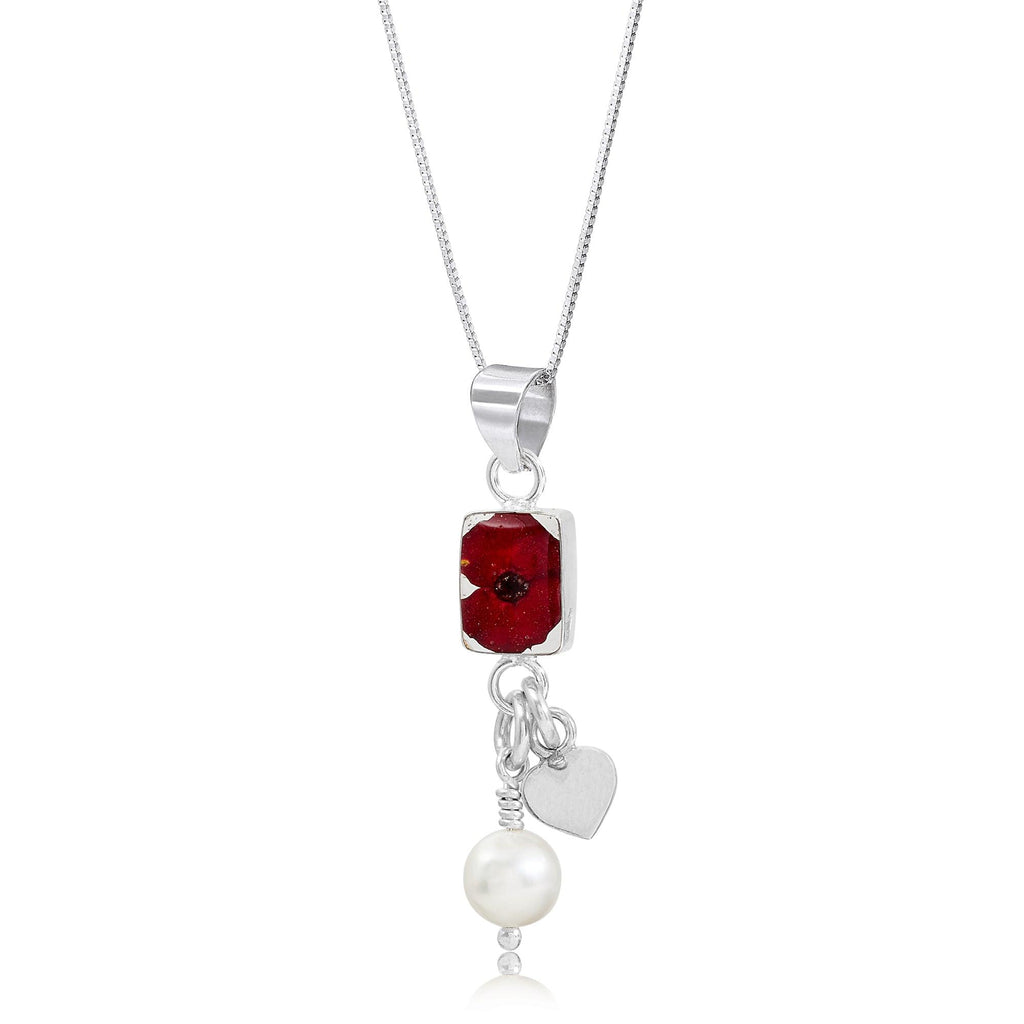 Poppy necklace by Shrieking Violet® Sterling silver charm pendant with a single mini poppy (Euphorbia milii) & a cultured pearl.