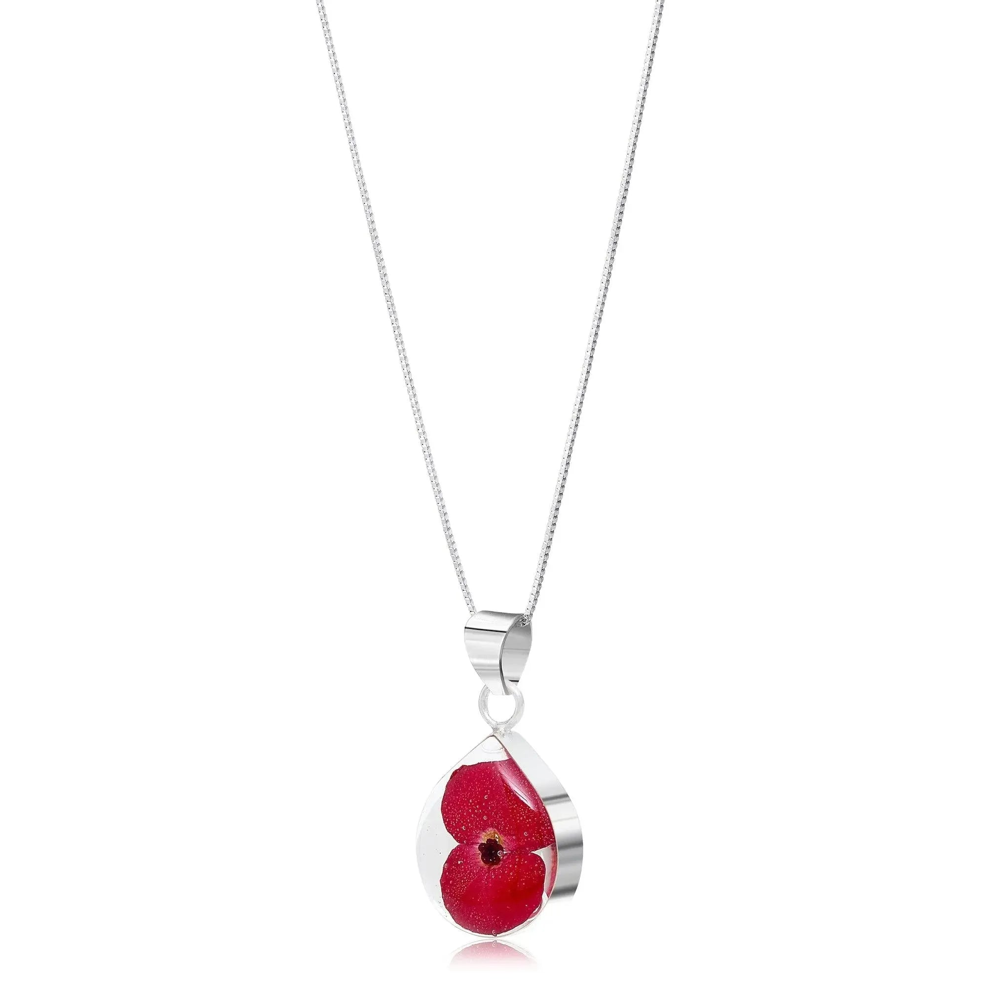 Poppy necklace by Shrieking Violet® Sterling silver teardrop pendant handmade with a single mini poppy (Euphorbia milii).