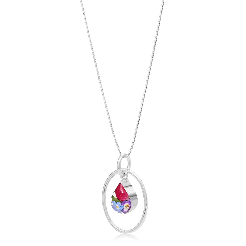 Real flower necklace by Shrieking Violet® Sterling silver oval pendant with real flowers & silver oval surround. Stylish gift for nature lovers.