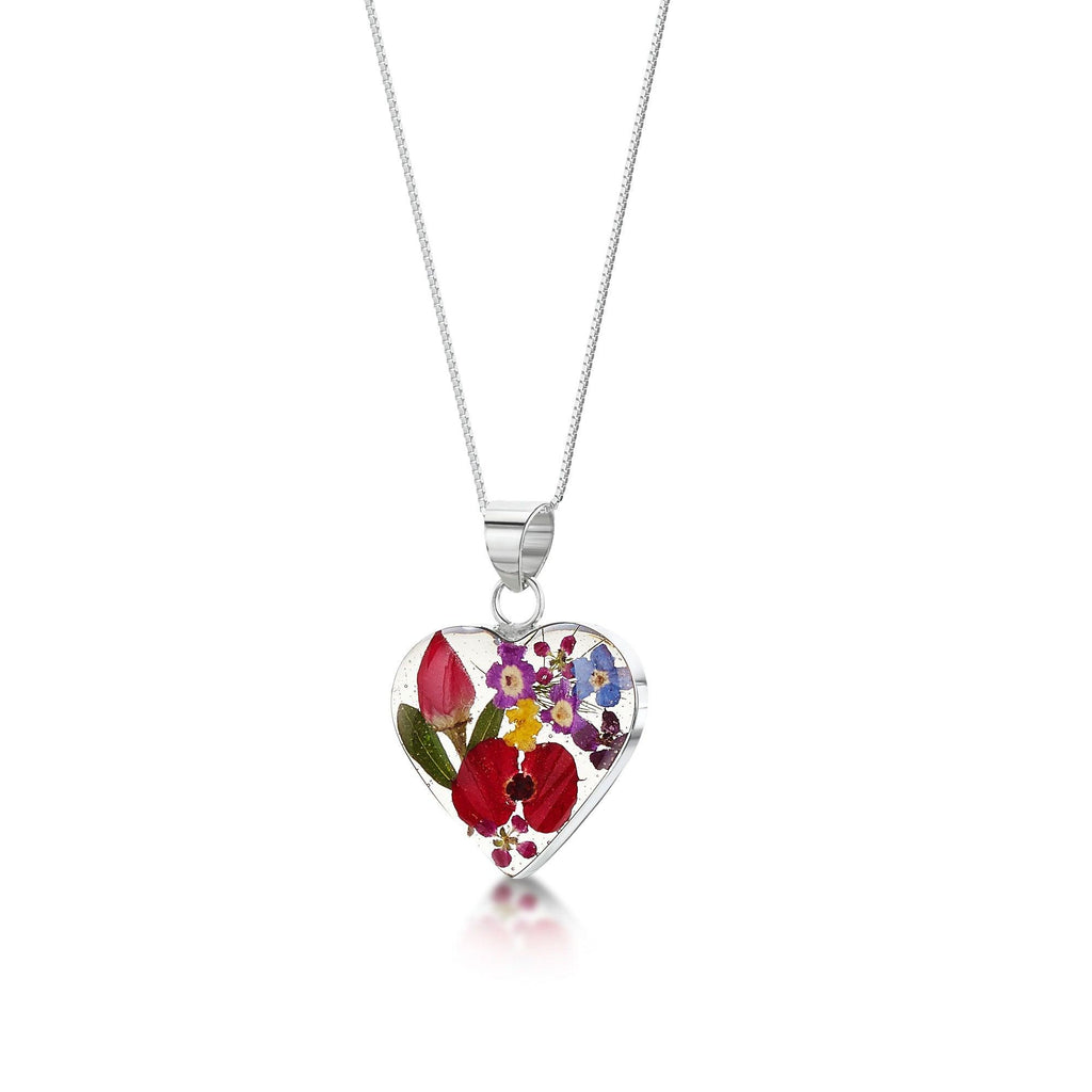 Sterling silver heart-shaped pendant necklace with real flowers. Perfect Mothers day gift.
