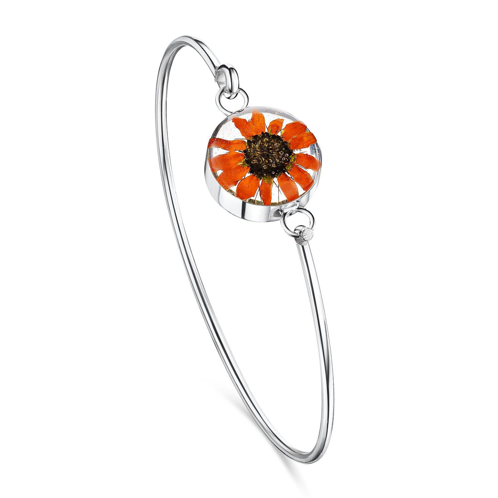 Sunflower bangle with real flowers by Shrieking Violet® Sterling silver bangle with a tiny black-eyed Susan sunflower. Includes giftbox.